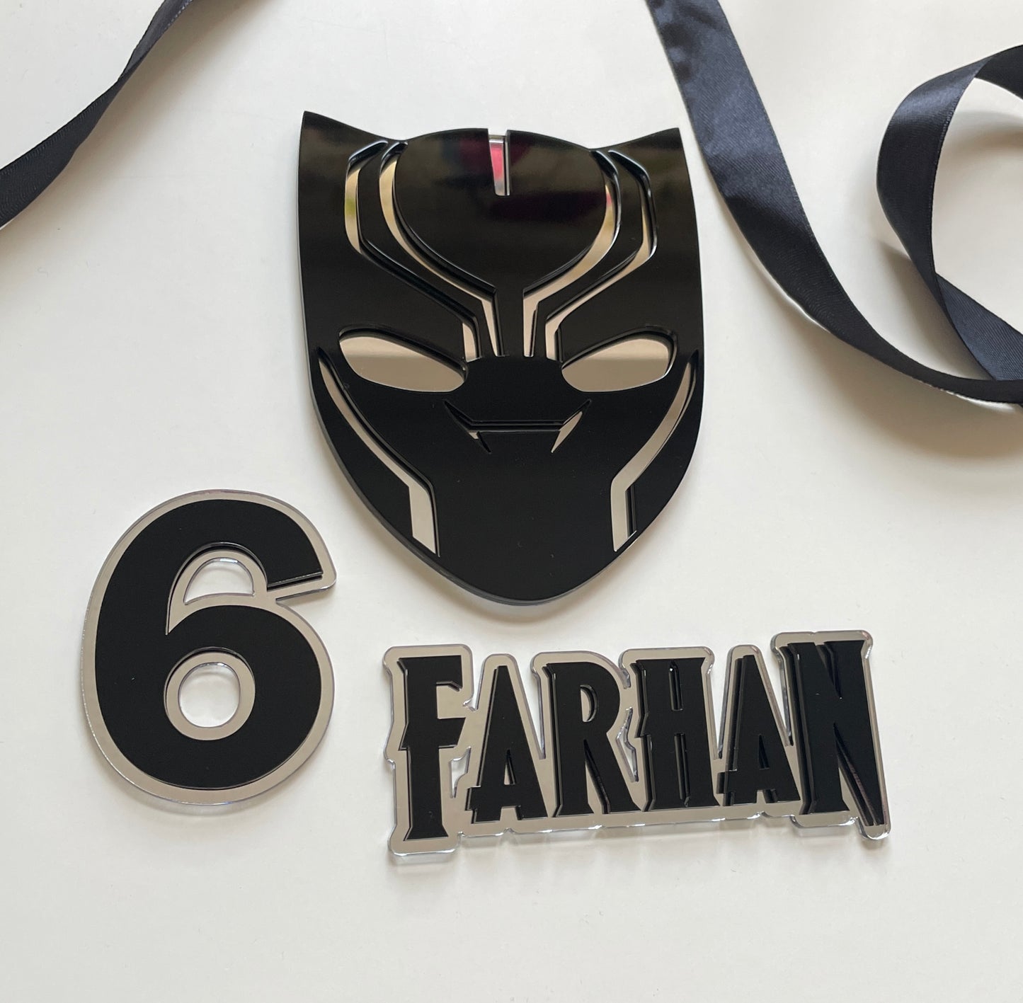 Black panther theme cake charm set