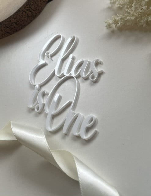 First birthday charm. Name is one.