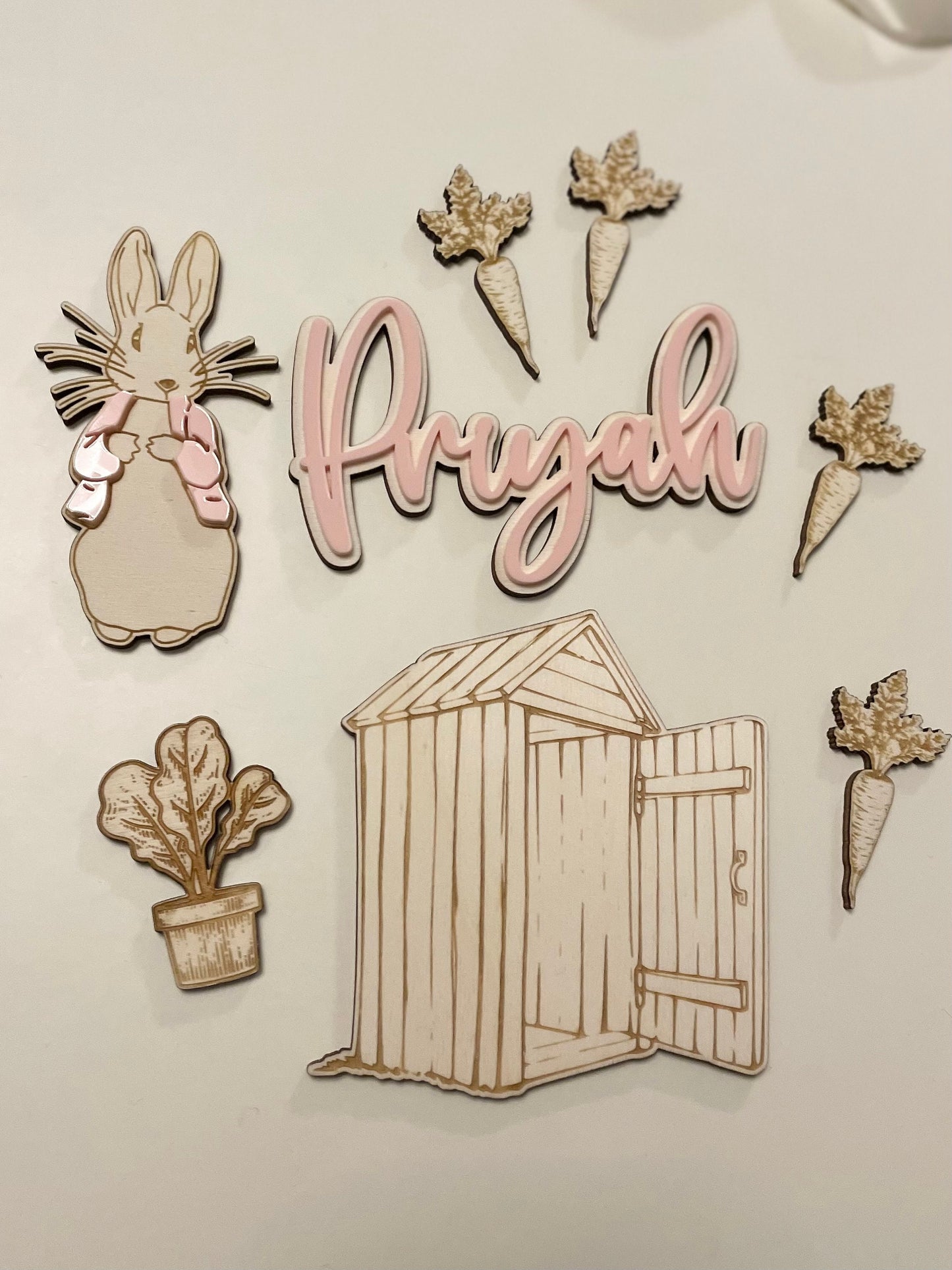 Wooden Rabbit garden theme topper set. Blue or pink.