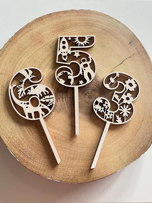 Customised wooden number cake toppers. Dinosoar / Space / Flowers