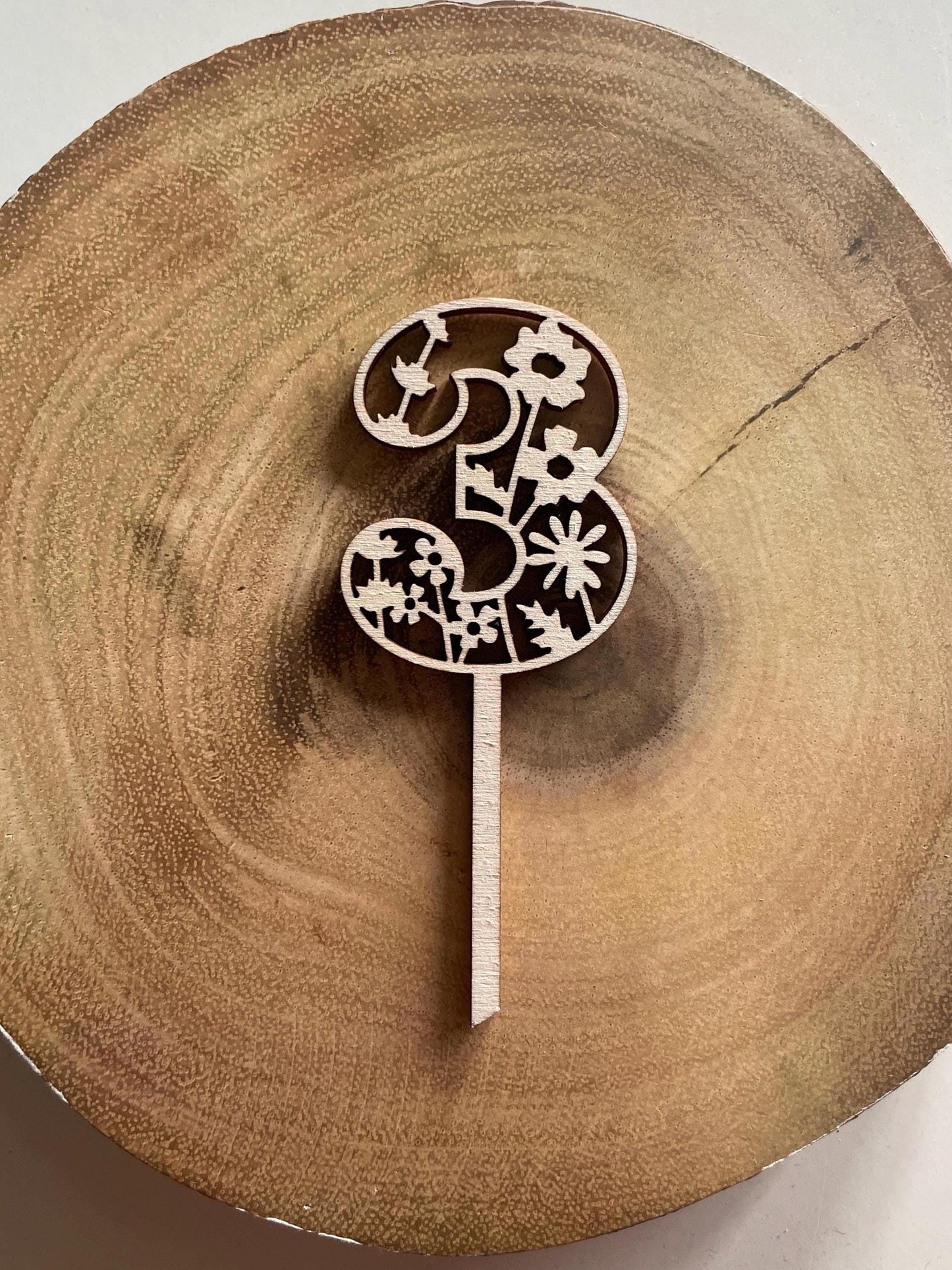 Customised wooden number cake toppers. Dinosoar / Space / Flowers