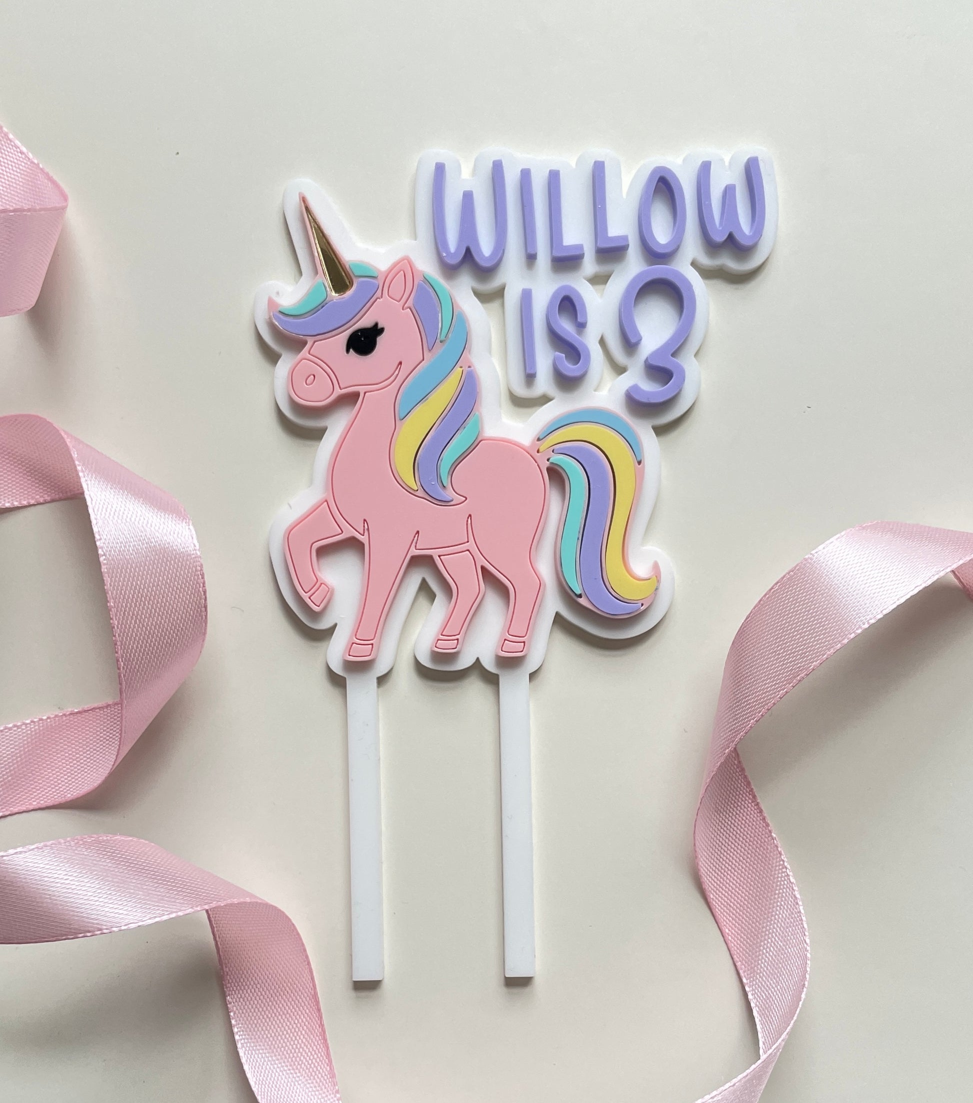 Pastel acrylic unicorn cake topper with name and age 