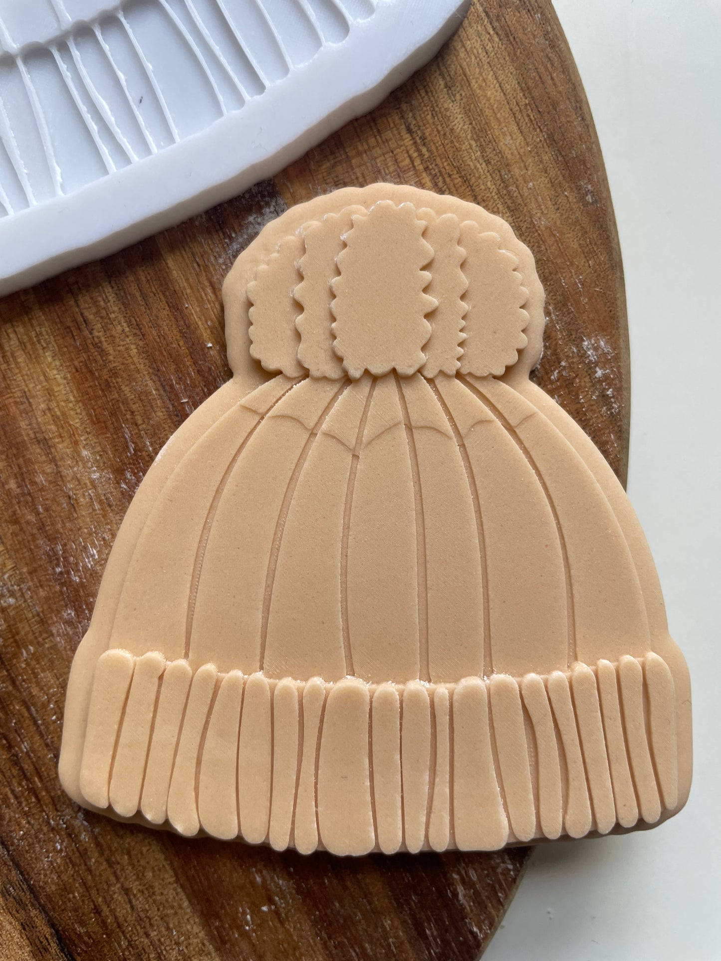 Winter hat with pom pom Embosser 