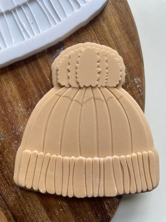 Winter hat with pom pom Embosser 