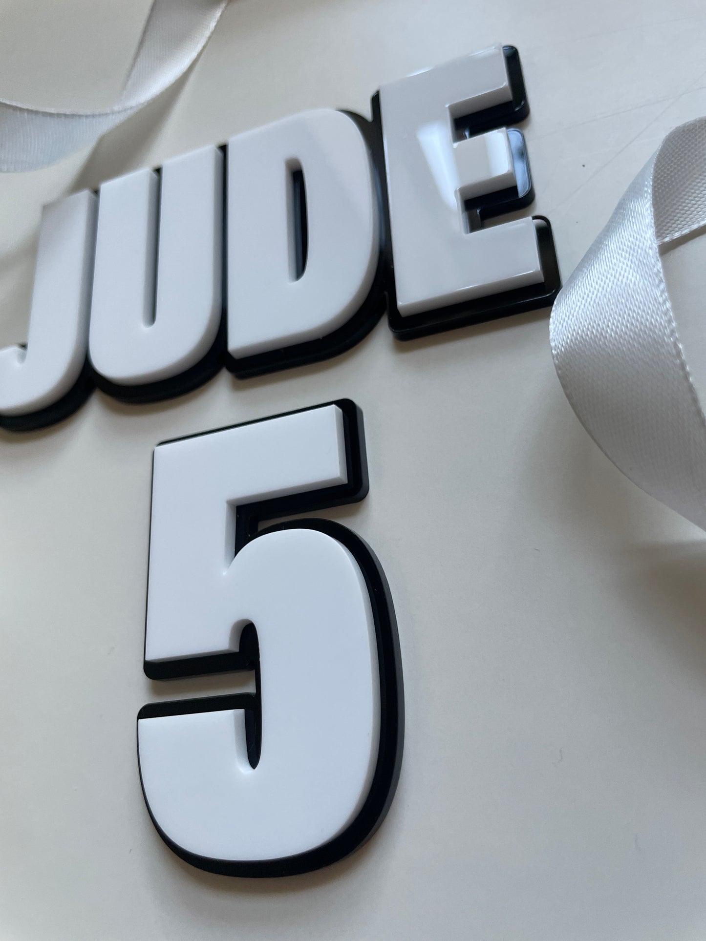 Black and White Acrylic Name and Age Cake Charm. Bold Comic Superhero Theme