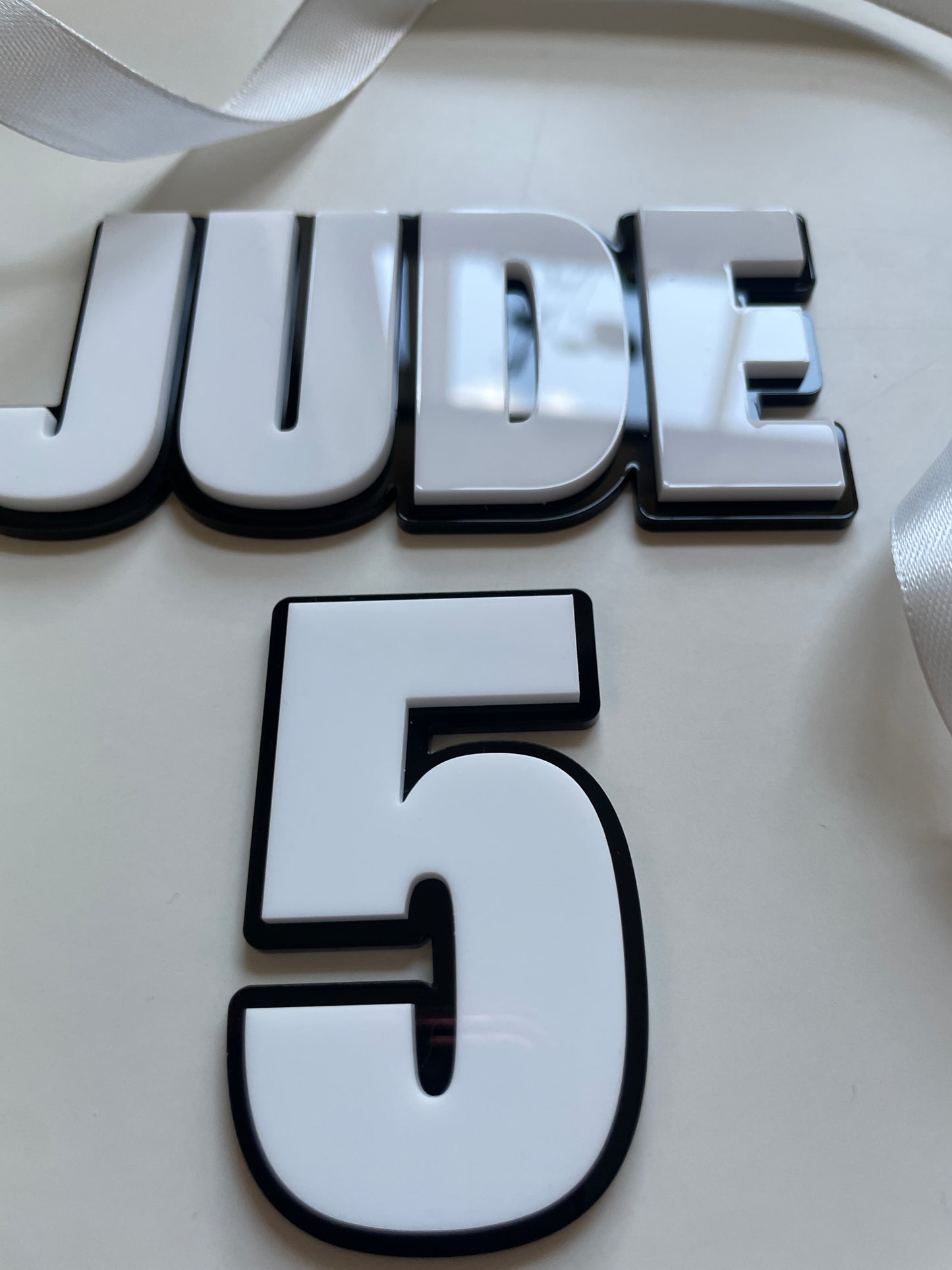 Black and White Acrylic Name and Age Cake Charm. Bold Comic Superhero Theme