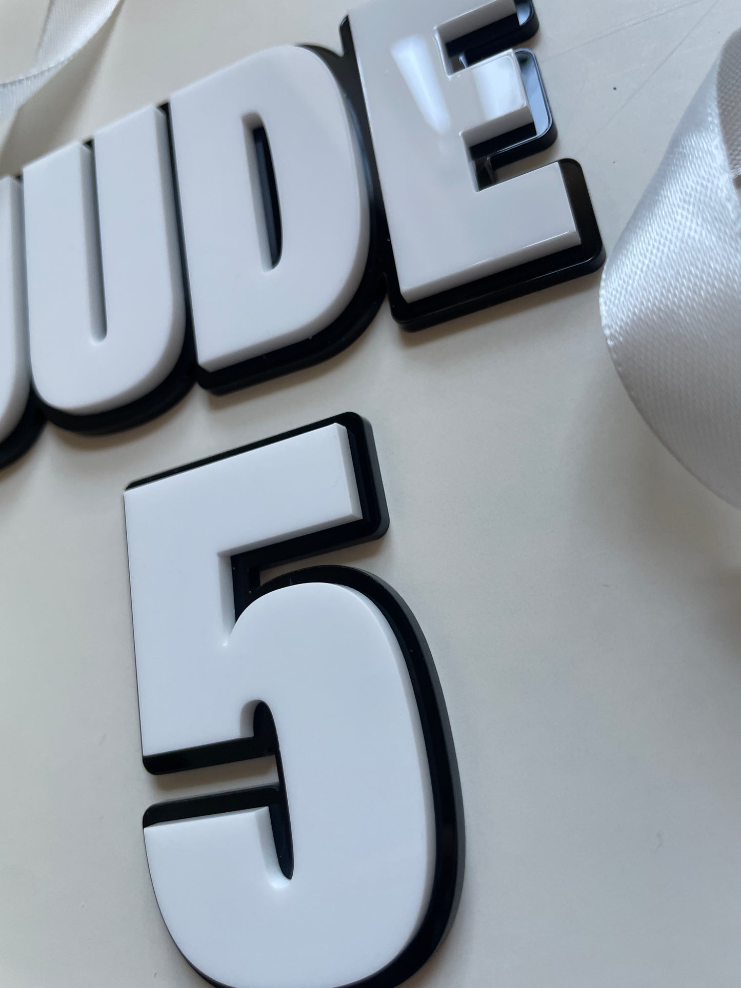 Black and White Acrylic Name and Age Cake Charm. Bold Comic Superhero Theme