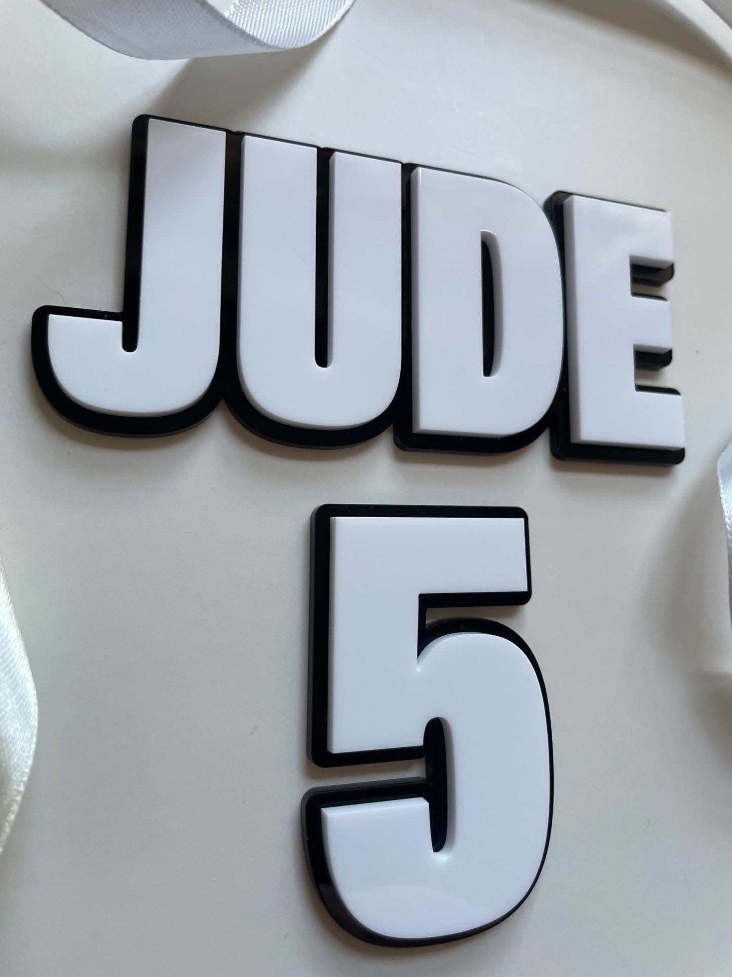 Black and White Acrylic Name and Age Cake Charm. Bold Comic Superhero Theme