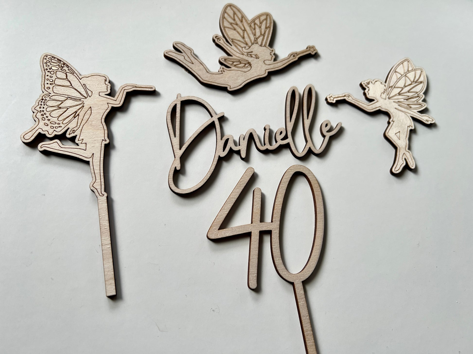 wooden fairy cake topper set with name and age charms 