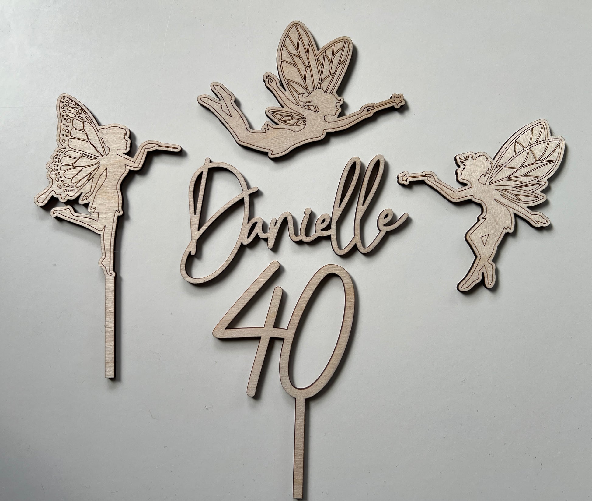 wooden fairy cake topper set with name and age charms 