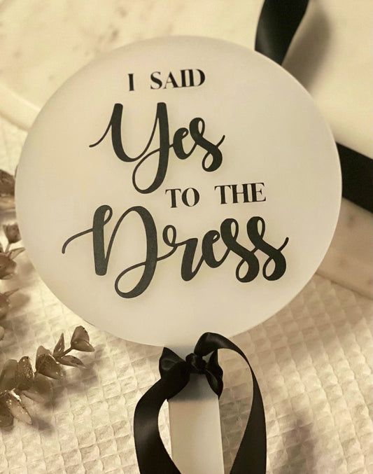 Yes to the dress sign / paddle. Bridal shop sign. Wedding dress sign. Black and white wedding. Monochrome.