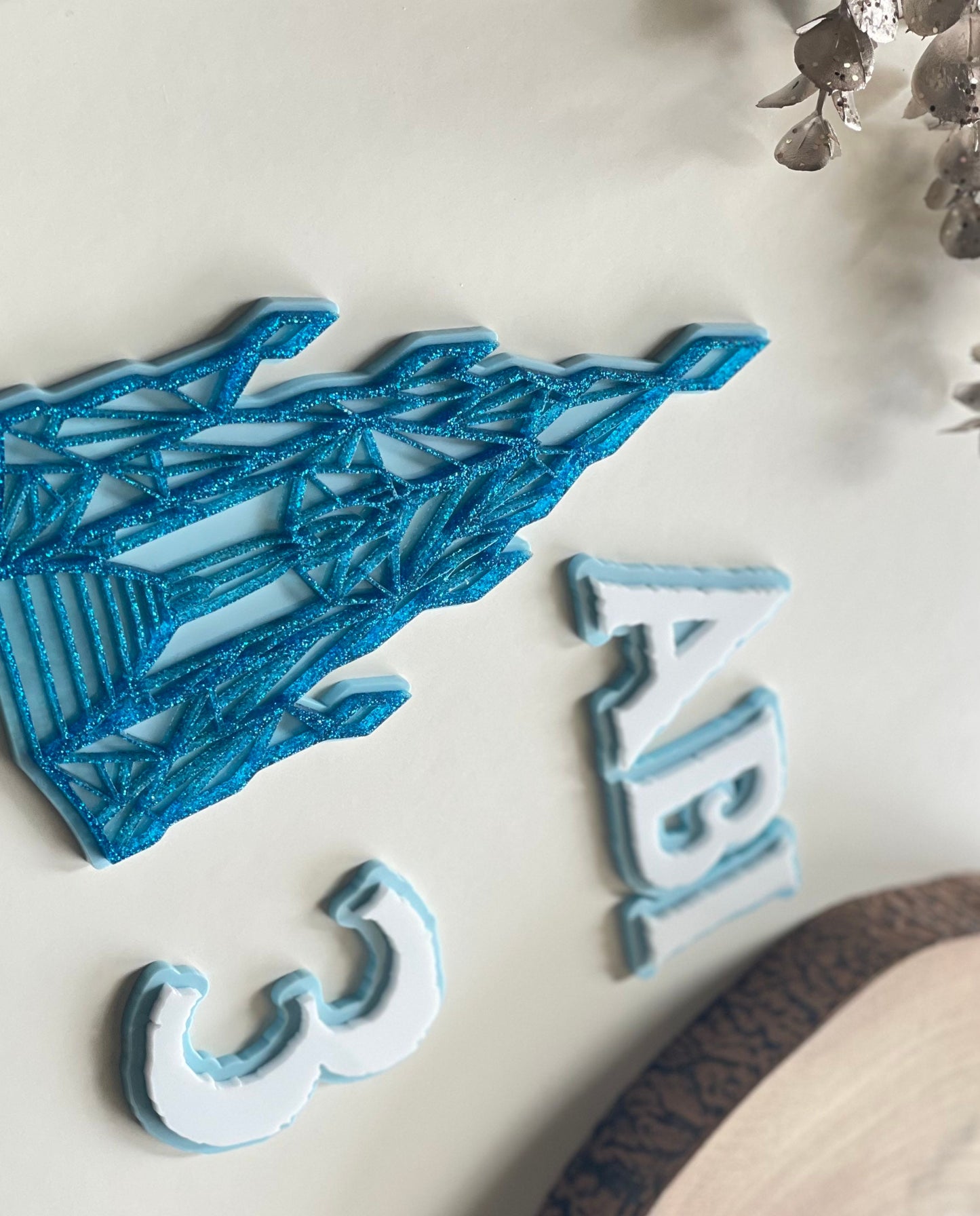 Name and age charm. Acrylic glitter Ice castle. Frozen / winter themed cake decorations.