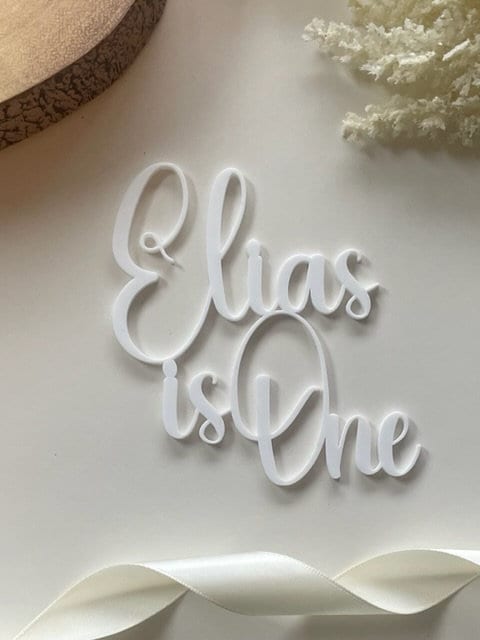 First birthday charm. Name is one.