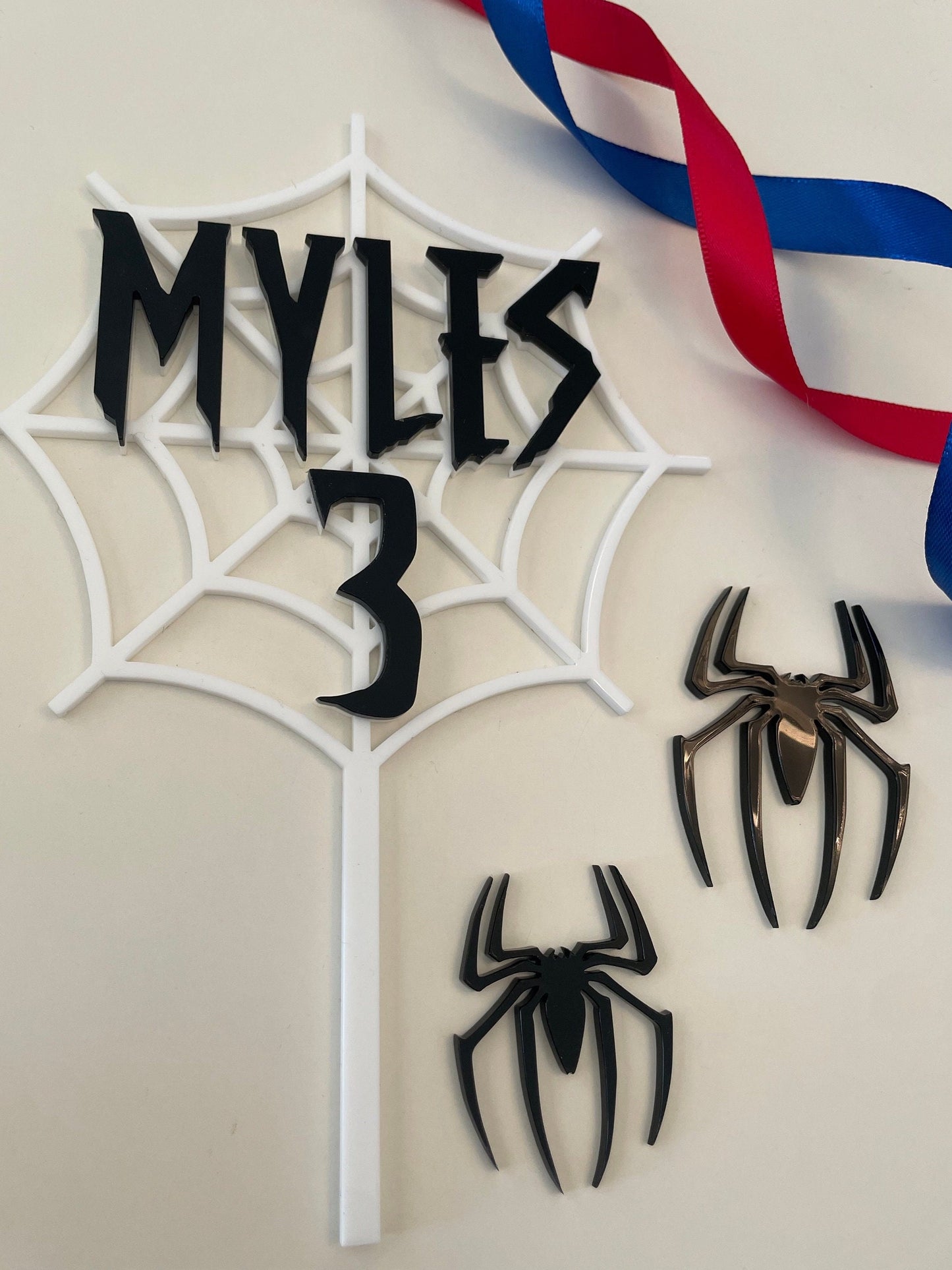 Spider web and spider topper set. Acrylic. Perfect for a spider man fan. Black and white acrylic cake topper set