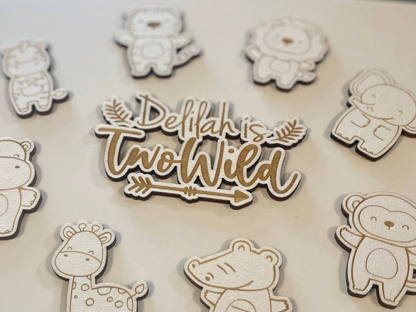 Two wild cake charm. Baby wooden animals