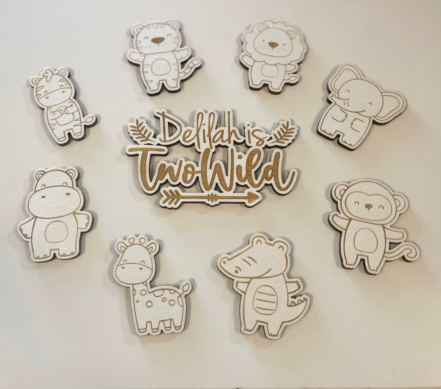 Two wild cake charm. Baby wooden animals