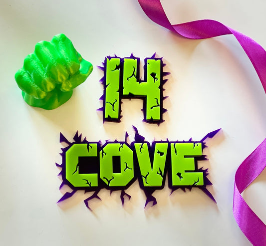 Green and purple acrylic name and age charm. Superhero themed.