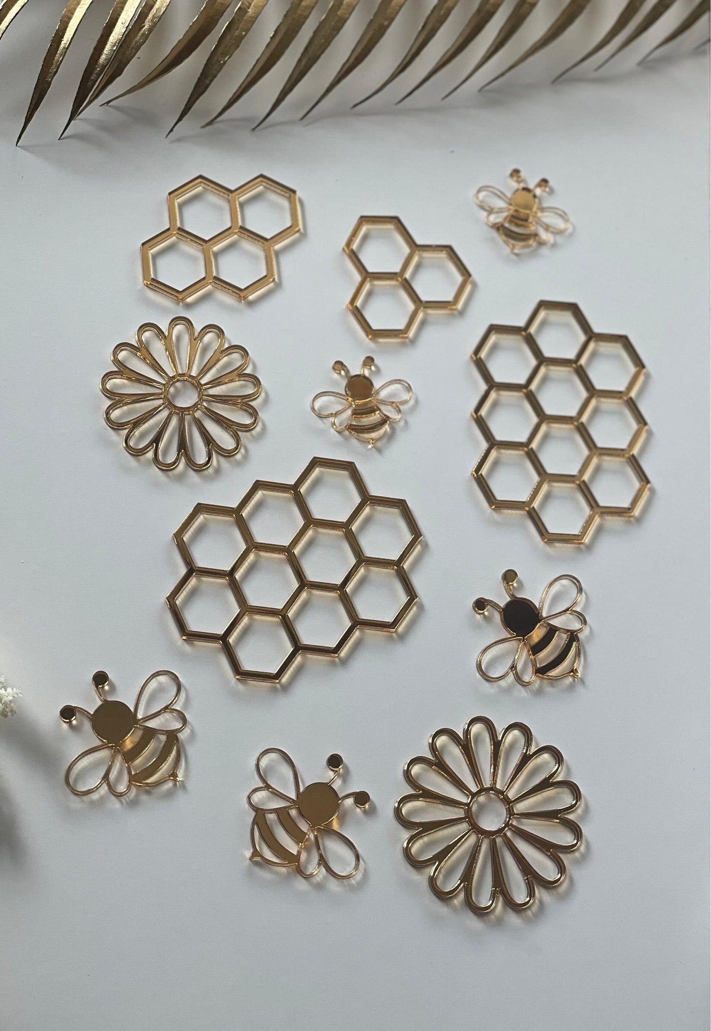 Bee gold acrylic charms . Honey comb charms.
