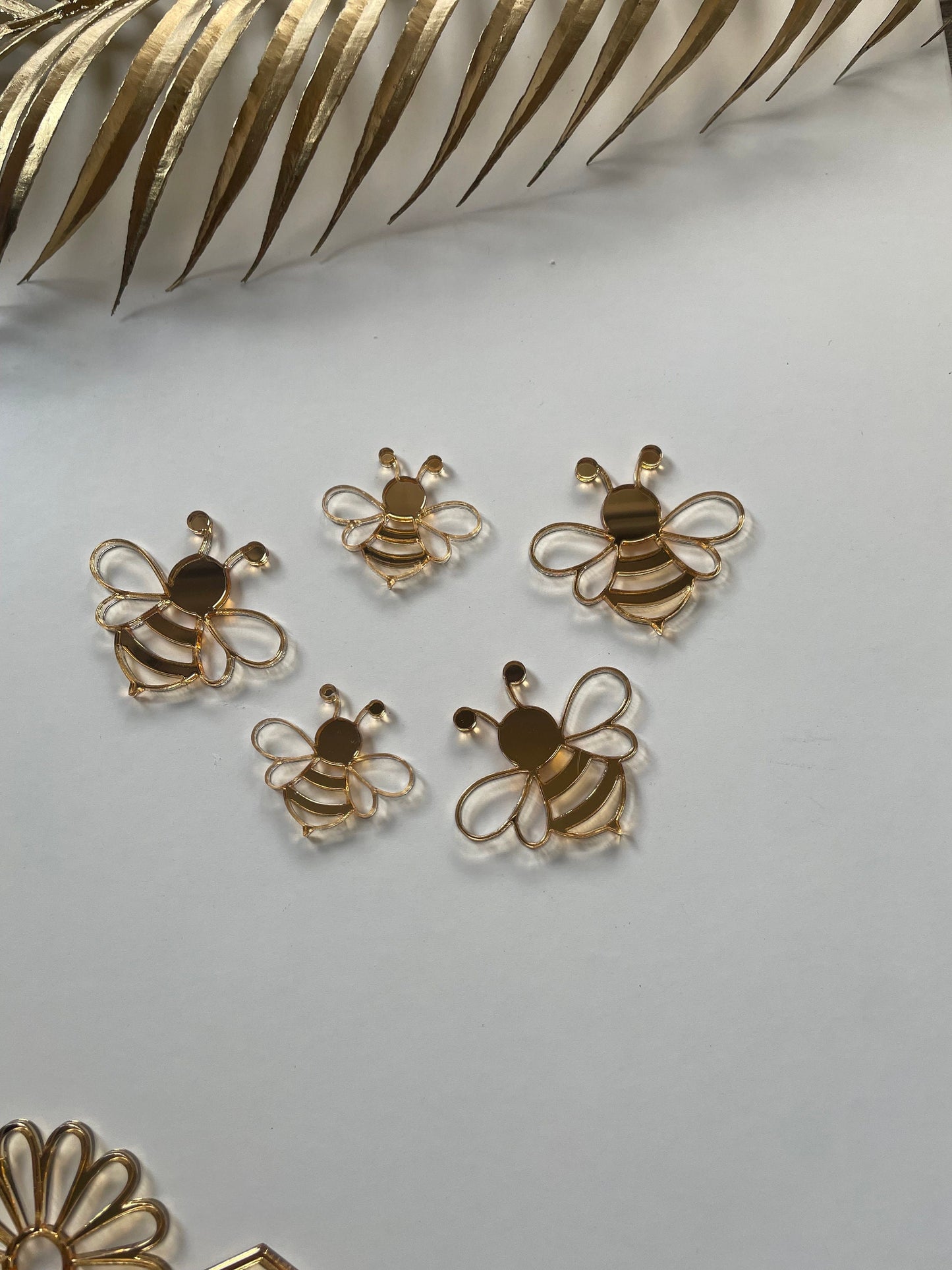 Bee gold acrylic charms . Honey comb charms.