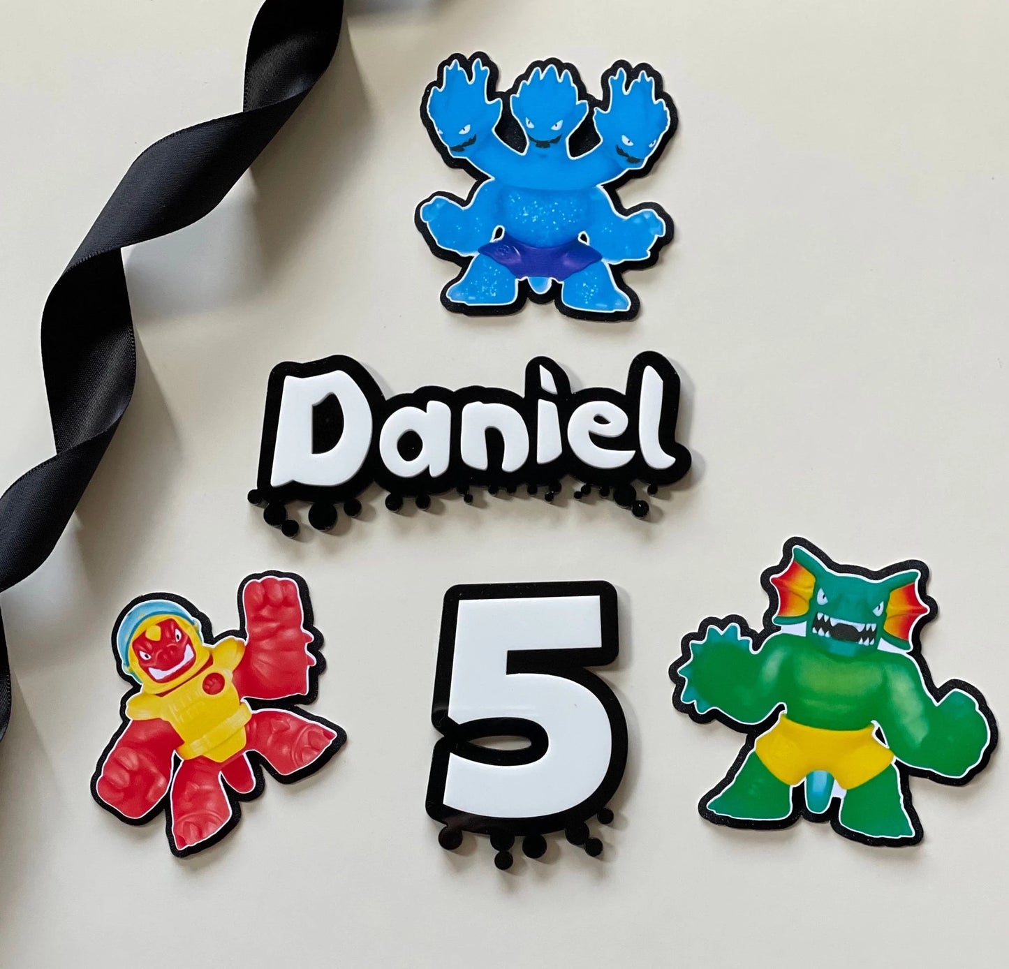 goo jit zu theme name and age acrylic charm topper set