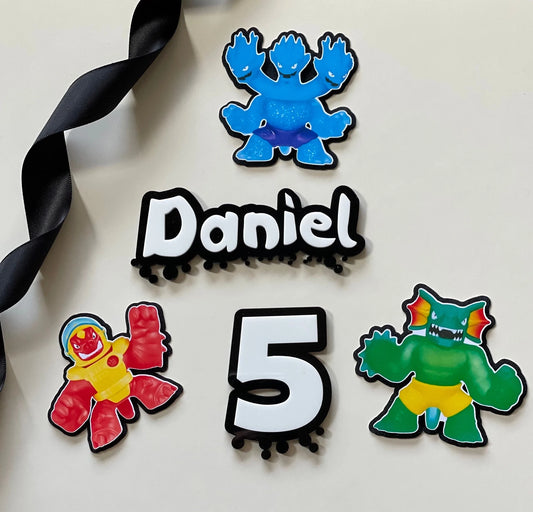 goo jit zu theme name and age acrylic charm topper set